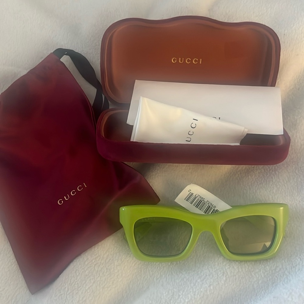 Green Gucci cat eye sunglasses